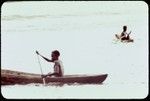 Boys in canoes