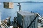 Loading explosives into [Taiwanese research vessel] Chiu Lien, Guam. Dr. Lu on van