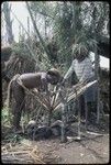 Food preparation: Pambo, Kiap (name) and Akis make above-ground oven