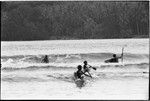 Canoeing in surf