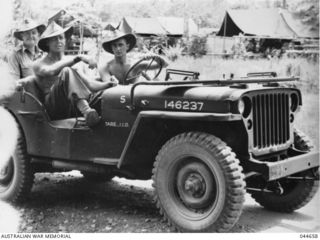 NEW GUINEA, 1943. OFFICIAL WAR ARTIST IVOR HELE - PASSENGER IN FRONT SEAT OF JEEP
