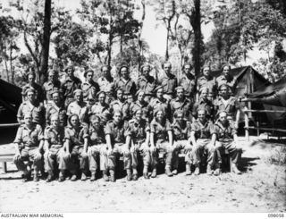 Members of C and D Subsection, U Heavy Battery, which has served on Bougainville for several months. Identified, left to right, back row: NX116386 Gunner (Gnr) A W Webster of Leichhardt, NSW; ..