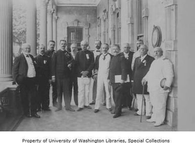 Thomas McArthur Anderson and staff outside of building in Honolulu, 1898