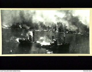 RABAUL, 1943-11-02. AIR STRIKE BY 75 B.25 MITCHELL BOMBERS AND 80 P38 LIGHTNING AIRCRAFT OF THE FIFTH AIR FORCE ON JAPANESE SHIPPING IN SIMPSON HARBOUR. (DONOR: W. TUCK)
