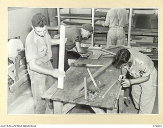 LAE, NEW GUINEA. 1944-11-11. CONVALESCENT PATIENTS OF THE 112TH CONVALESCENT DEPOT WORKING IN THE UNIT HOBBIES HUT. IDENTIFIED PERSONNEL ARE: SX19496 SAPPER E. STONE, 20TH FIELD COMPANY ..