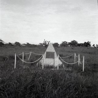 CAPE WOM, NEW GUINEA. 1954-08. THE OBELISK ERECTED ON THE WAR TIME AIRSTRIP NEAR WEWAK, TO COMMEMORATE THE SURRENDER OF THE 18TH JAPANESE ARMY BY LIEUTENANT-GENERAL HATAZO ADACHI AND THE JAPANESE ..