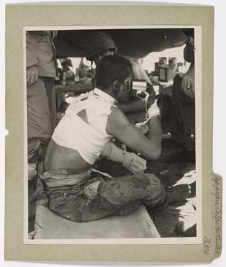 Photograph of Japanese Prisoner Drinking Coffee